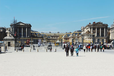 Group of people in front of building
