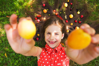 Portrait of a smiling girl holding ice cream