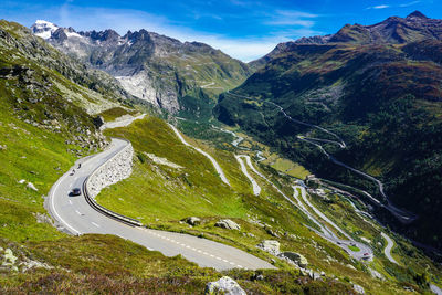 High angle view of road amidst mountains against sky