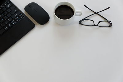 Directly above shot of coffee cup on table