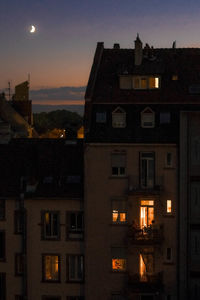 Buildings in city at night