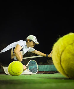 Close-up of tennis balls on playing field