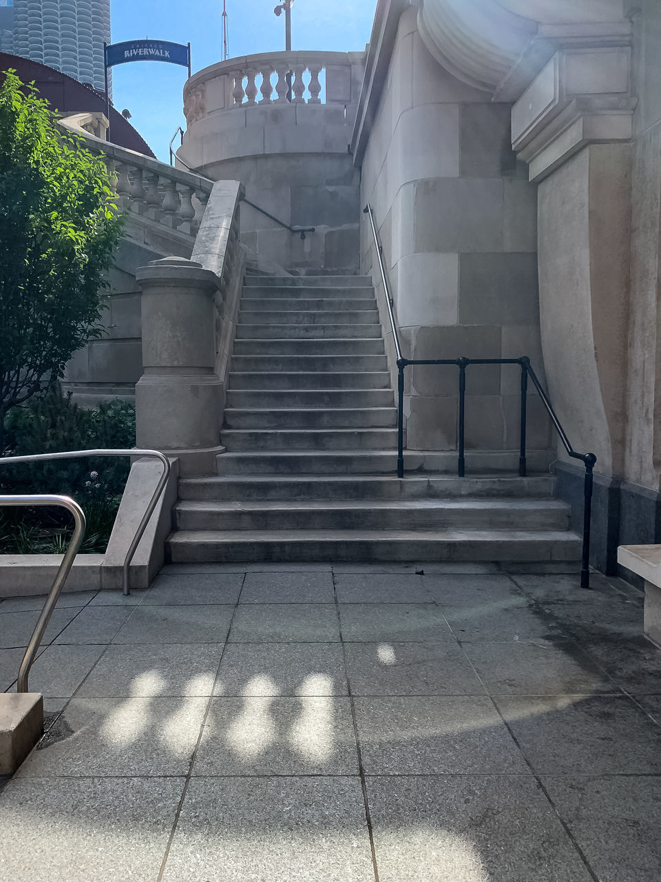 LOW ANGLE VIEW OF STAIRCASE AGAINST BUILDING