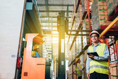 Portrait of man working at construction site