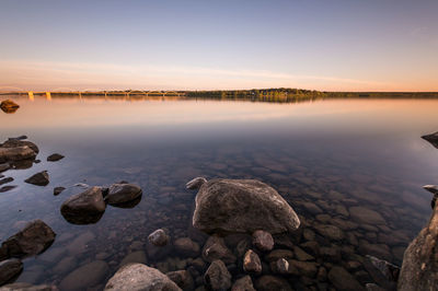 Scenic view of lake during sunset