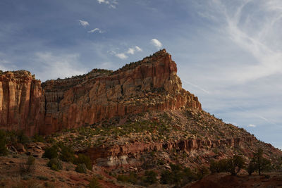 Scenic view of rock formations against sky