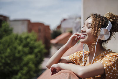 Woman sitting outdoors