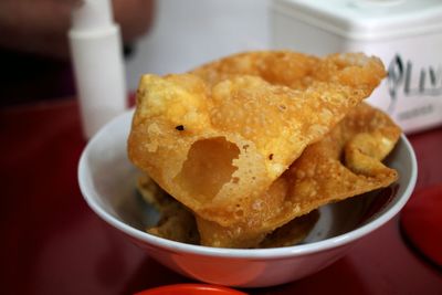 High angle view of fried dumplings in plate on table