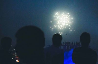 Firework display at night