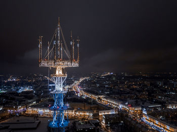 High angle view of illuminated buildings in city at night