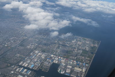 High angle view of buildings in city against sky