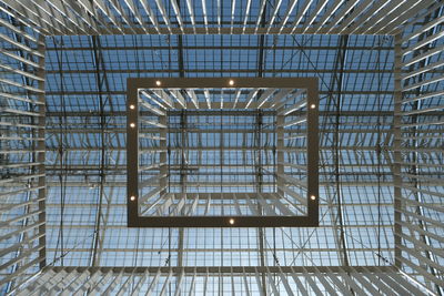 Low angle view of skylight in building