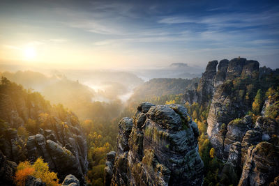 Scenic view of mountains against sky during sunset