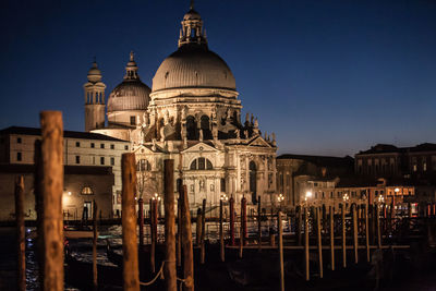 View of illuminated cathedral against sky at night