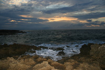 Scenic view of sea against sky during sunset