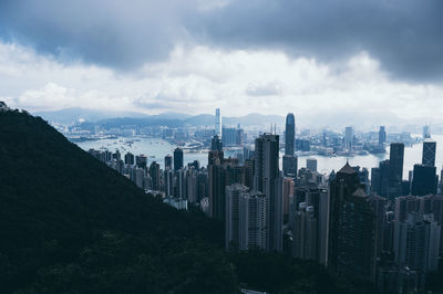 High angle view of modern buildings in city against sky