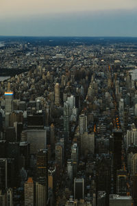 Aerial view of city buildings against sky