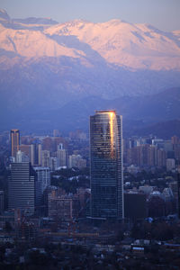 Modern buildings in city against sky