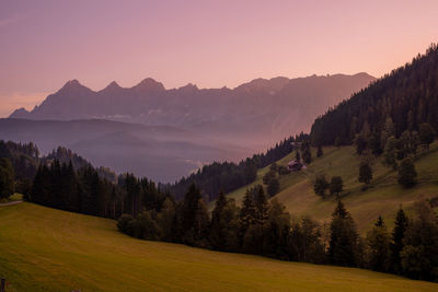 Scenic view of mountains against sky during sunset