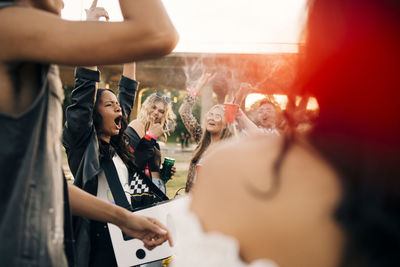 People enjoying music concert