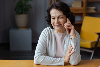 Young woman using mobile phone