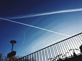 Low angle view of vapor trail in sky