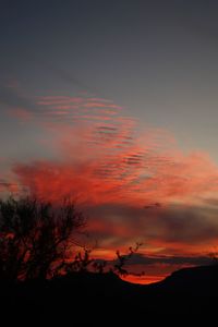 Scenic view of dramatic sky during sunset