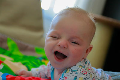 Portrait of cute baby girl at home