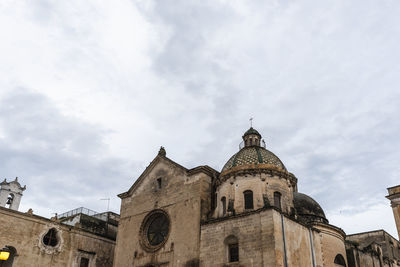 Low angle view of historic building against sky