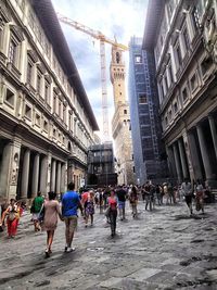 Tourists in front of building