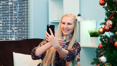 Young woman using mobile phone