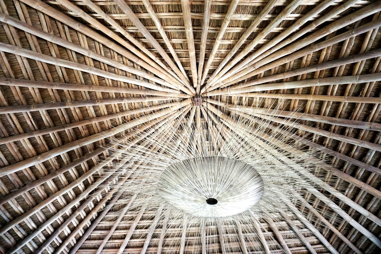 LOW ANGLE VIEW OF ILLUMINATED CHANDELIER