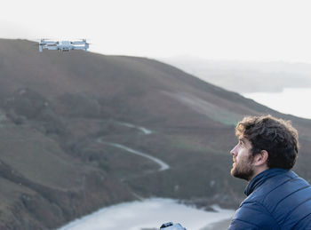 Young boy flying drone. boy flying drone