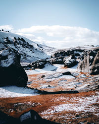 Scenic view of snowcapped mountains against sky