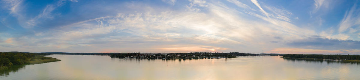 Panoramic view of lake against sky during sunset