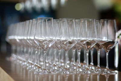 Wineglasses arranged on table