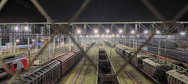 High angle view of trains at shunting yard at night