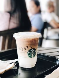 Close-up of coffee cup on table