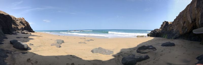 Panoramic view of beach against sky