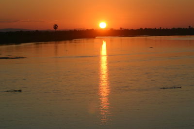 Scenic view of sunset over sea