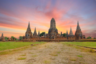 Ancient temple against sky during sunset