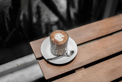 High angle view of coffee cup on table