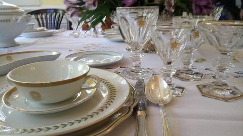 Close-up of glasses on table in restaurant