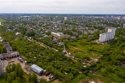 High angle view of buildings in city against sky