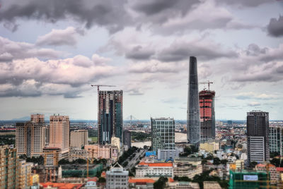 Modern buildings in city against sky