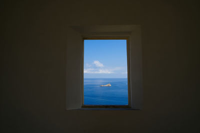 Sea seen through window