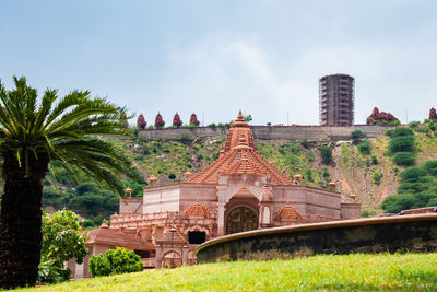 Artistic red stone jain temple at morning from unique angle