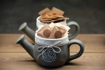 Close-up of coffee cup on table