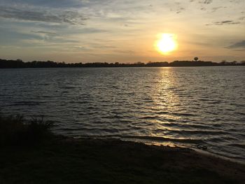 Scenic view of sunset over river