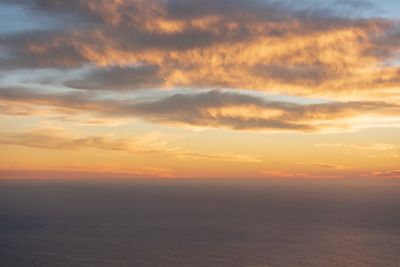 Scenic view of dramatic sky during sunset